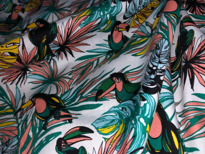 100% Cotton Poplin  Beach Prints 58" wide available in 4 prints bright orange flowers, / bird ,red with blue skates and the beach scene