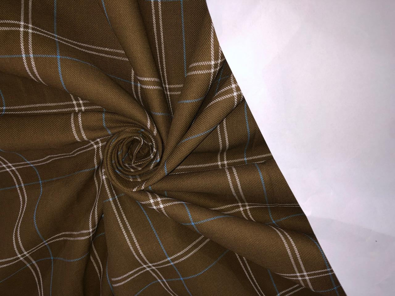 100% Cotton twill  plaids with  available in 3 colors REDS, BLUES and GREENS/GREEN,RUSTY BROWN AND BLUE  AND BROWN,WHITE AND BLUE