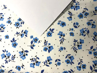 Cotton canvas duck fabric White with blue floral motifs [16523]