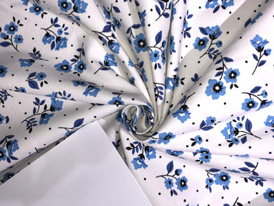 Cotton canvas duck fabric White with blue floral motifs [16523]