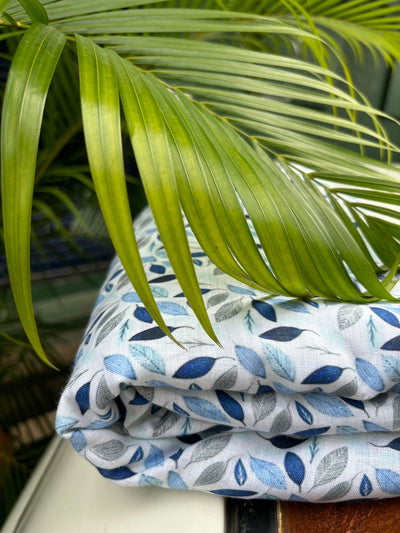 100% linen  digital print fabric 58" wide white with shades of blue leaves [16112]