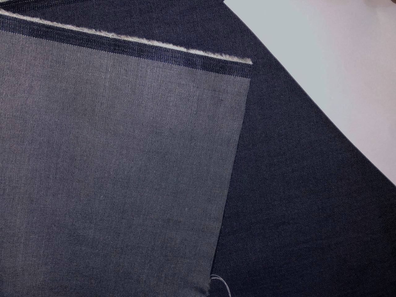 100% Tencel  Denim 5 ounce  Fabric  58" wide available in 7 colors blue/ dark denim blue/ charcoal grey / charcoal black/parrot green/bright yellow and sage