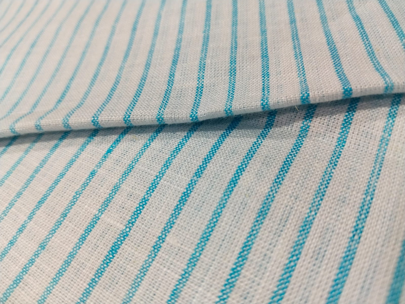 100% Linen stripe 60's Lea Fabric 58" wide available in two colors blue/ white and ivory ,yellow and brown .