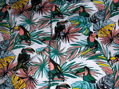 100% Cotton Poplin  Beach Prints 58" wide available in 4 prints bright orange flowers, / bird ,red with blue skates and the beach scene