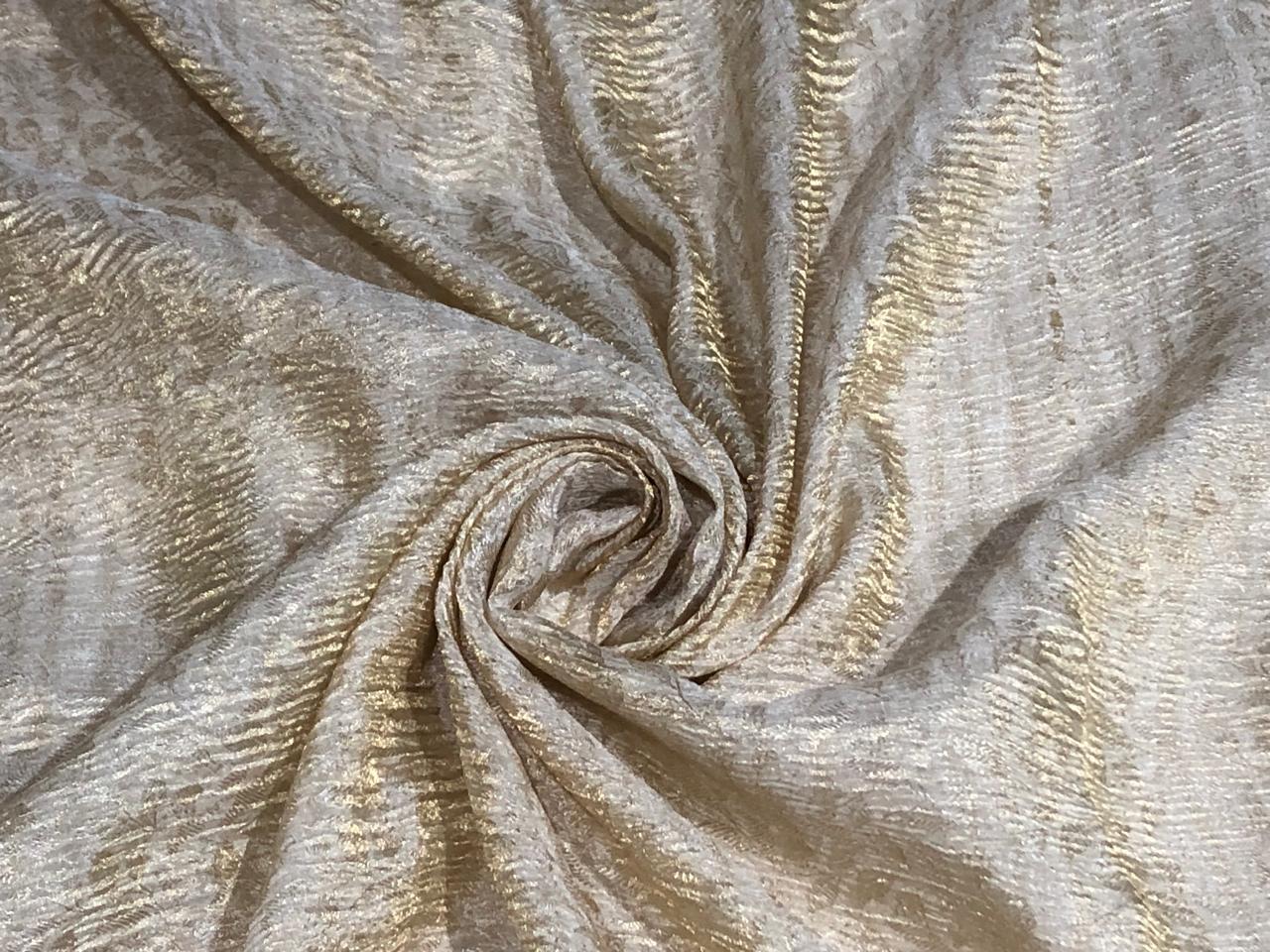 100% silk crepe rich ivory CRUSH jacquard with subtle gold effect 80 grams  44" wide available in 2 designs leaf and floral