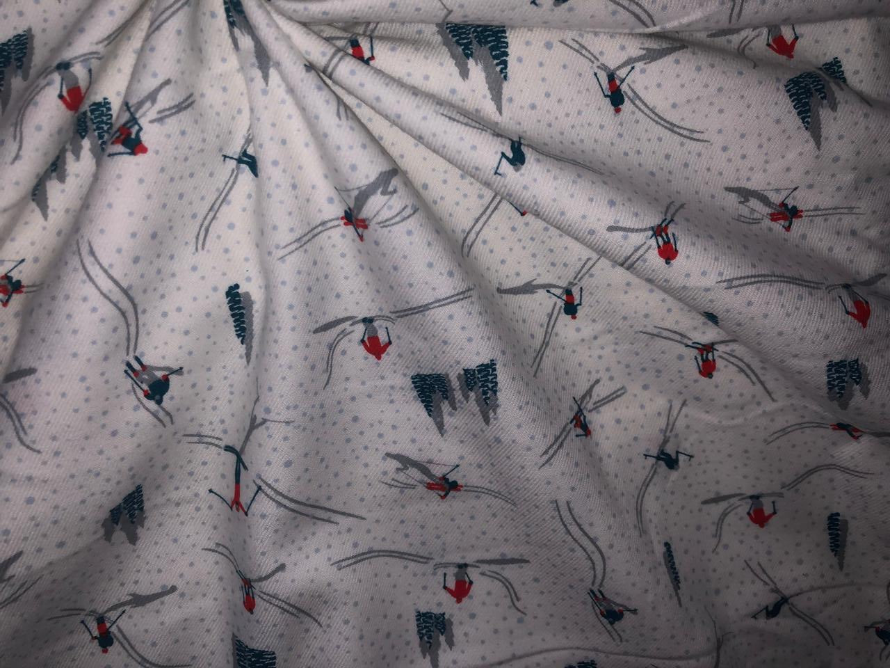 100% Cotton flannel Print 58"wide available in 3 prints penguin, snowmen and skiing on ice