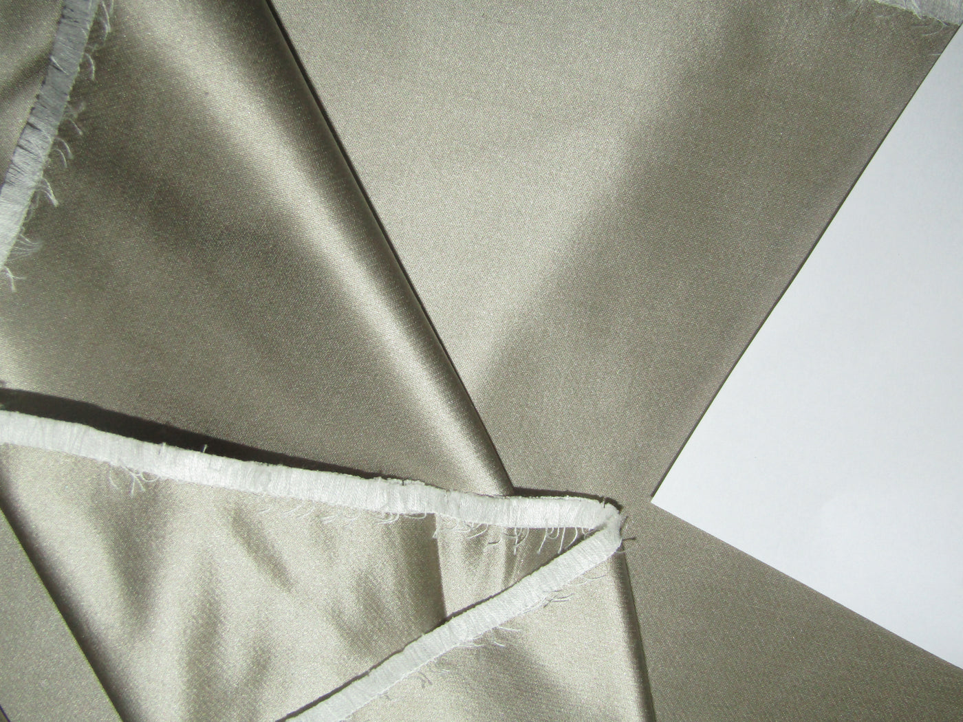 50% Silk 50% Cotton ,Cotton Silk 54" wide available in 5 colors khaki x black ,white gold ,sand gold, gold and mint