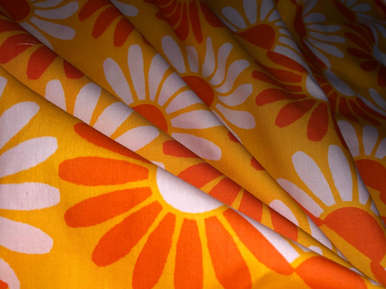 100% Cotton Poplin  Beach Prints 58" wide available in 4 prints bright orange flowers, / bird ,red with blue skates and the beach scene