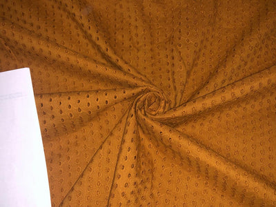 100 % Cotton Eyelet Embroidered Fabric 44" wide available in four colors mustard, beige, orange and bright pink