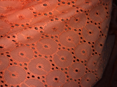 100 % Cotton Eyelet Embroidered Fabric 44" wide available in four colors mustard, beige, orange and bright pink