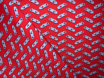 100% Cotton Poplin  Beach Prints 58" wide available in 4 prints bright orange flowers, / bird ,red with blue skates and the beach scene