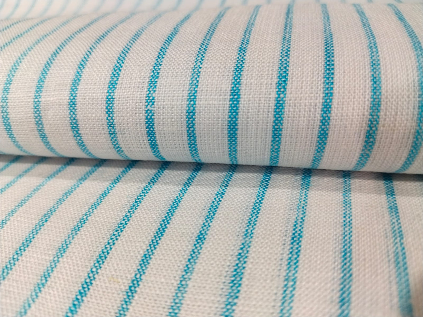 100% Linen stripe 60's Lea Fabric 58" wide available in two colors blue/ white and ivory ,yellow and brown .