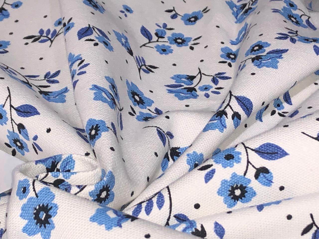 Cotton canvas duck fabric White with blue floral motifs [16523]