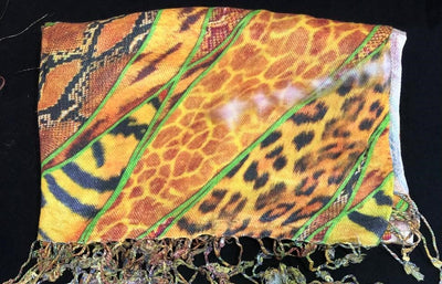 SCARVES/STOLES WITH FRINGES 70" X 27" available in 2 styles animal print and floral print