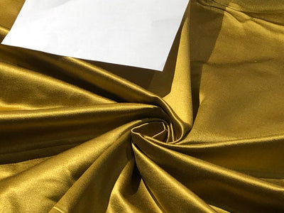 50% Silk 50% Cotton ,Cotton Silk 54" wide available in 6 colors khaki x black ,white gold ,sand gold, gold ,mint and metallic gold