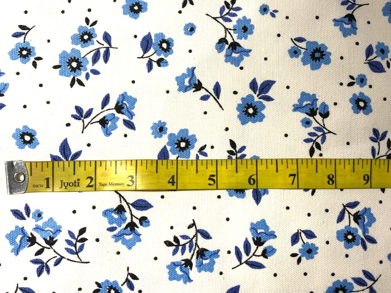 Cotton canvas duck fabric White with blue floral motifs [16523]